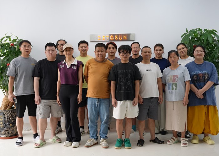 DETOSUN apparel team at the company facility