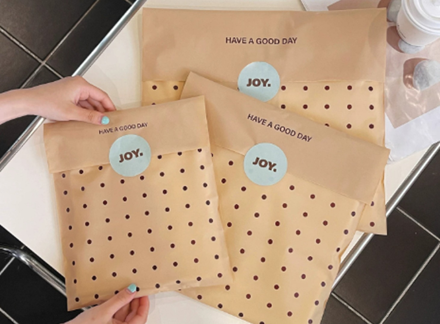 Branded apparel packaging reference for order fulfillment